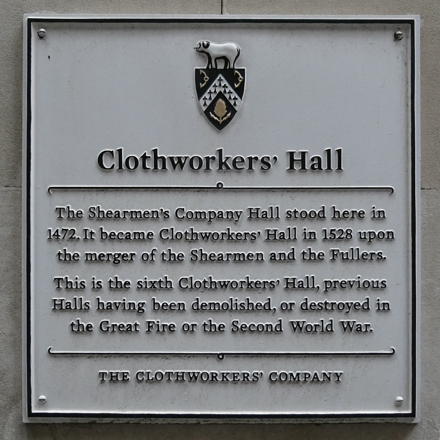 A plaque on the Company's hall featuring a render of the new coat of arms.
